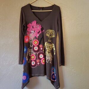 Brightly colored. Ladies top. FUN, Fitted ,small. Perfect for a hairdresser.